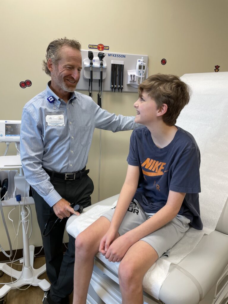 Dr Steven Julius with patient